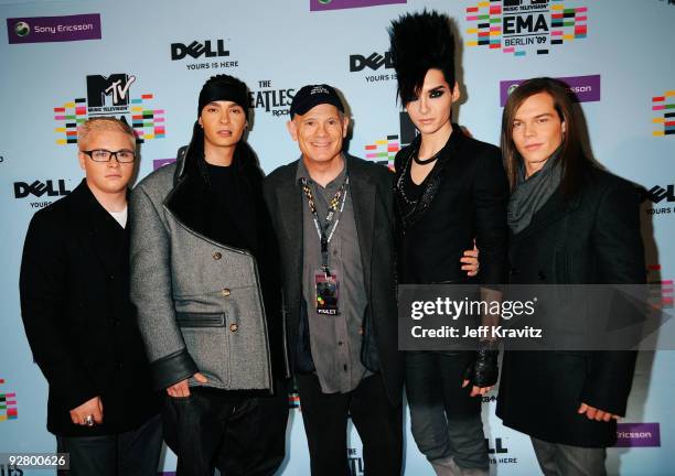 Bill Roedy, Chairman and Chief Executive of MTV Networks International, poses with Tokio Hotel at the 2009 MTV Europe Music Awards held at the O2...