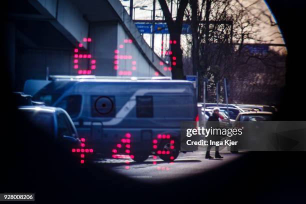 Speedometer of the police measures the speed of road users on February 27, 2018 in Berlin, Germany. The upper value describes the distance and the...