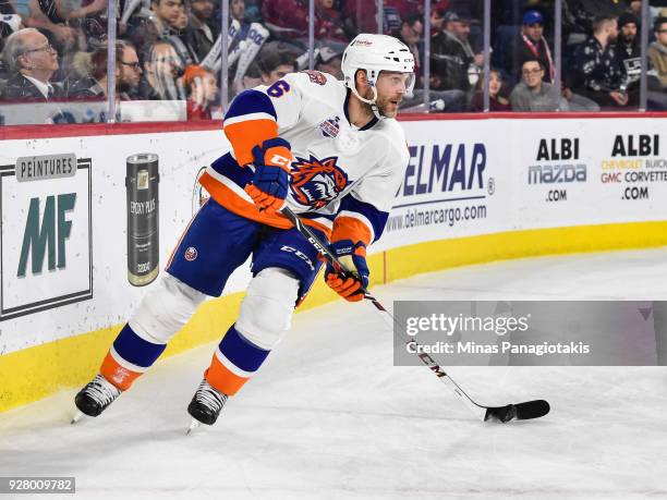 Andre Benoit of the Bridgeport Sound Tigers skates the puck against the Laval Rocket during the AHL game at Place Bell on March 2, 2018 in Laval,...