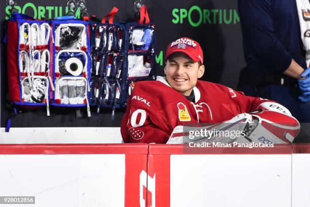 Golatender Zachary Fucale of the Laval Rocket winks as he looks on from the bench against the Bridgeport Sound Tigers during the AHL game at Place...