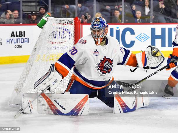 Goaltender Kristers Gudlevskis of the Bridgeport Sound Tigers protects his net against the Laval Rocket during the AHL game at Place Bell on March 2,...