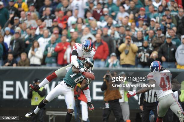 Wide Receiver Jeremy Macklin of the Philadelphia Eagles catches a touchdown pass in front of cornerback Corey Webster of the New York Giants on...