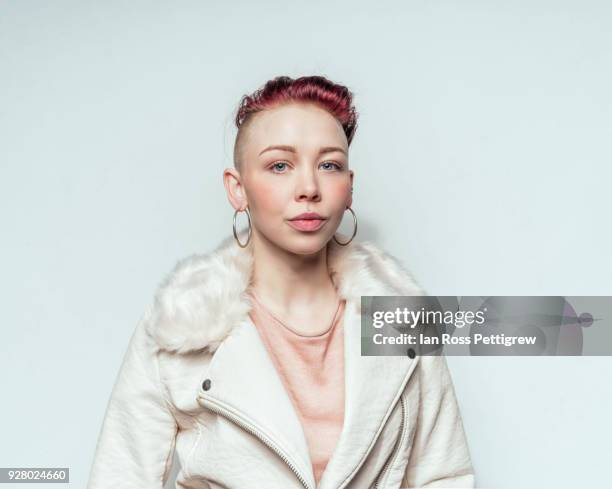 beautiful punk woman in white leather jacket - shaved head stock pictures, royalty-free photos & images