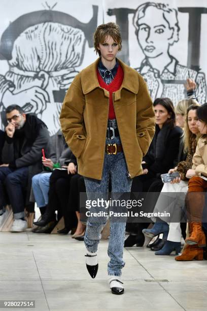 Model walks the runway during the Miu Miu show as part of the Paris Fashion Week Womenswear Fall/Winter 2018/2019 on March 6, 2018 in Paris, France.