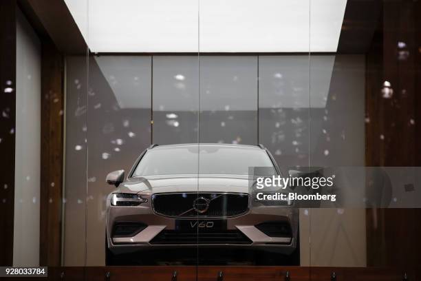 The new Volvo V60 automobile sits on display on the Volvo stand on the opening day of the 88th Geneva International Motor Show in Geneva,...