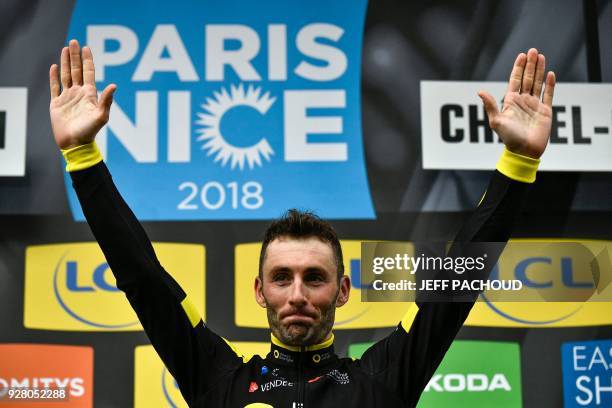 Direct Energie team French rider Jonathan Hivert celebrates on the podium after winning the third stage of the Paris - Nice cycling race between...