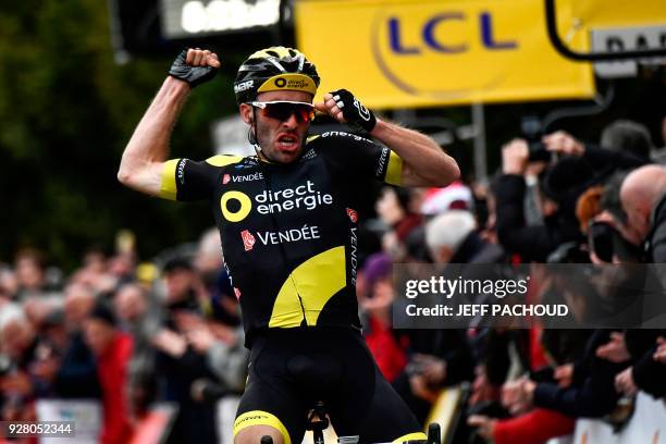 Direct Energie team French rider Jonathan Hivert celebrates as he crosses the finish line to win the third stage of the Paris - Nice cycling race...