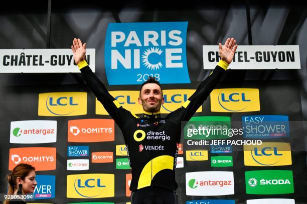 Direct Energie team French rider Jonathan Hivert celebrates on the podium after winning the third stage of the Paris - Nice cycling race between...