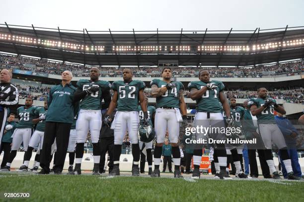 Linebacker Will Witherspoon, linebacker Tracy White, defensive end Jason Babin and linebacker Joe Mays of the Philadelphia Eagles observe the...