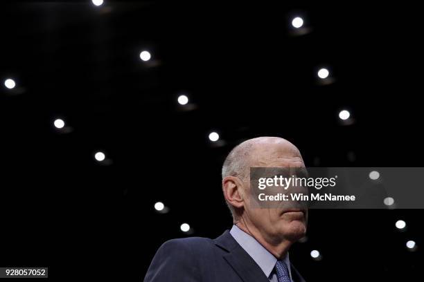 Director of National Intelligence Daniel Coats arrives for testimony at a hearing held by the Senate Armed Services Committee March 6, 2018 in...