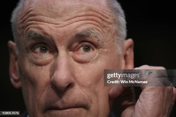 Director of National Intelligence Daniel Coats answers questions during a hearing held by the Senate Armed Services Committee March 6, 2018 in...