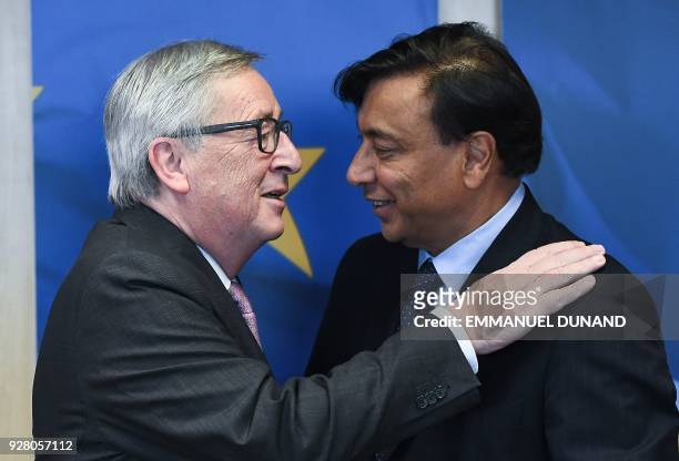 ArcelorMittal Chairman and CEO Lakshmi Mittal is welcomed by European Commission President Jean-Claude Juncker at the European Commission in Brussels...