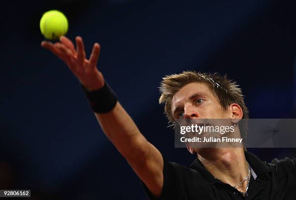 Jarkko Nieminen of Finland serves to Stanislas Wawrinka of Switzerland during Day Four of the Davidoff Swiss Indoors Tennis at St Jakobshalle on...