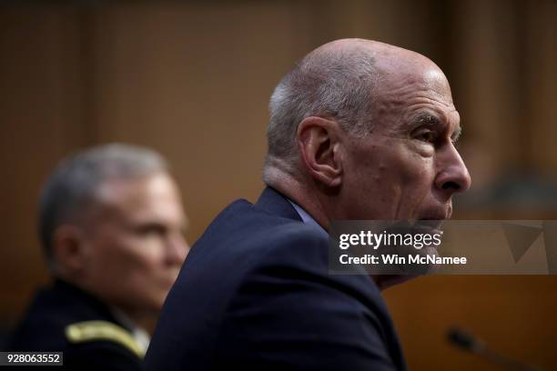 Director of National Intelligence Daniel Coats and U.S. Army Lt. Gen. Robert P. Ashley , director of the Defense Intelligence Agency, answer...