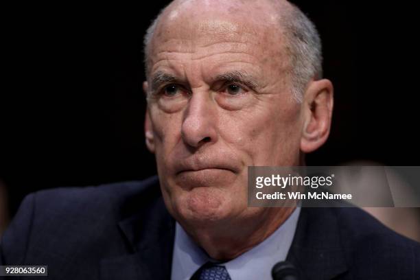 Director of National Intelligence Daniel Coats answers questions during a hearing held by the Senate Armed Services Committee March 6, 2018 in...