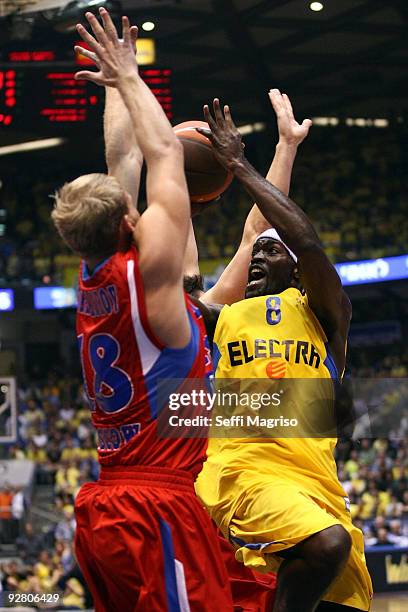 Doron Perkins, #8 of Maccabi Electra competes with Anton Ponkrashov, #18 of CSKA Moscow in action during the Euroleague Basketball Regular Season...