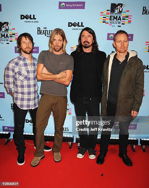 Taylor Hawkins, Chris Shiflett, Dave Grohl and Nate Mendel of Foo Fighters arrive for the 2009 MTV Europe Music Awards held at the O2 Arena on...