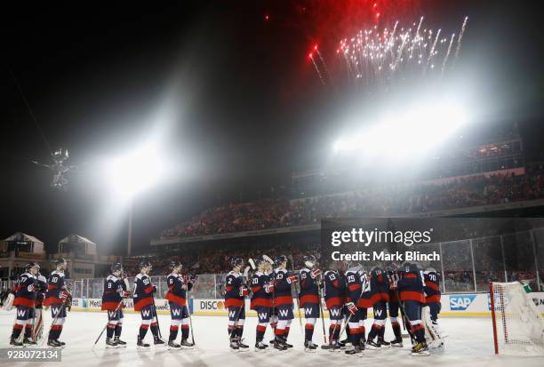 The Washington Capitals celebrate their 5-2 win over the Toronto Maple Leafs after the 2018 Coors Light NHL Stadium Series game at the Navy-Marine...