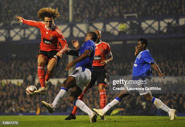 Sylvain Distin of Everton blocks the shot of David Luiz of Benfica during the UEFA Europa League Group I match between Everton and Benfica at...