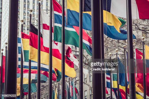 national ( state) flags in midtown manhattan - day un stockfoto's en -beelden