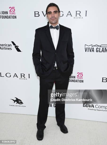 Anastasios Papapostolou attends the 26th annual Elton John AIDS Foundation Academy Awards Viewing Party sponsored by Bulgari, celebrating EJAF and...
