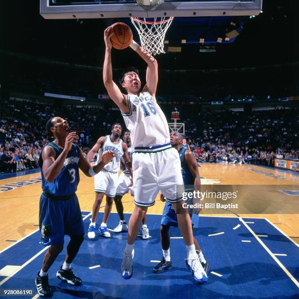 ZhiZhi Wang of the Dallas Mavericks rebounds circa 2001 at the Reunion Arena in Dallas, Texas. NOTE TO USER: User expressly acknowledges and agrees...