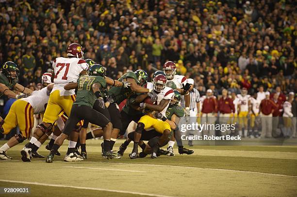 Joe McKnight in action vs Oregon. Eugene, OR CREDIT: Robert Beck