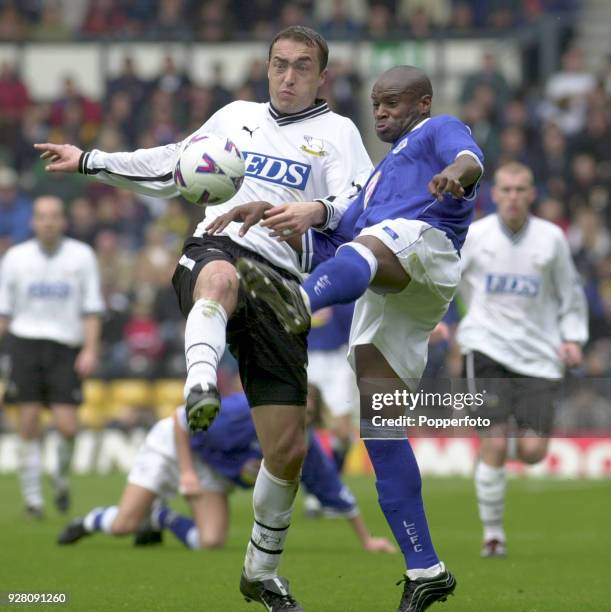 Branko Strupar of Derby County and Frank Sinclair of Leicester City in action during the Premier League match between Derby County and Leicester City...