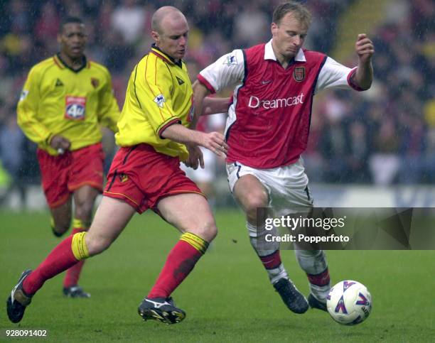 Robert Page of Watford and Dennis Bergkamp of Arsenal in action during the FA Carling Premiership match between Watford and Arsenal at Vicarage Road...