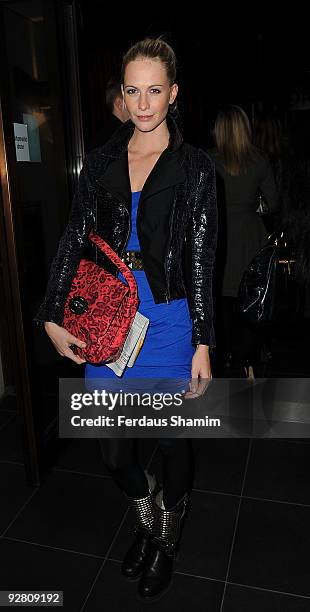 Poppy Delevingne attends the book launch party for Nicky Haslam's autobiography - 'Redeeming Features' on November 5, 2009 in London, England.