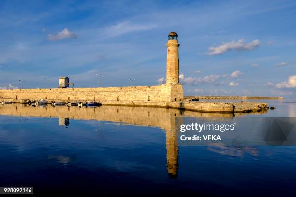 egyptian lighthouse at the old venetian harbour, rethymno, crete, greece - crete rethymnon stock pictures, royalty-free photos & images