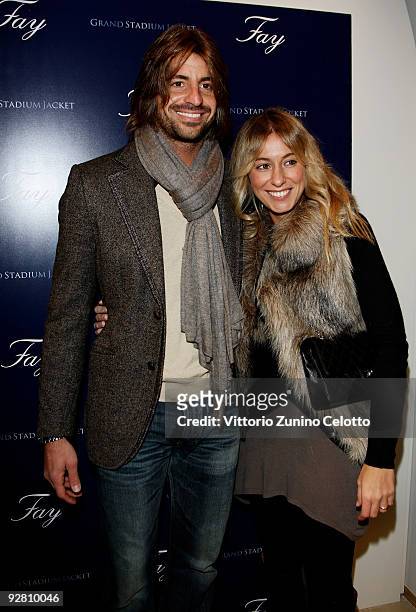 Marco Storari and his wife attend the Grand Stadium Jacket cocktail party at the Fay Boutique on November 5, 2009 in Milan, Italy.
