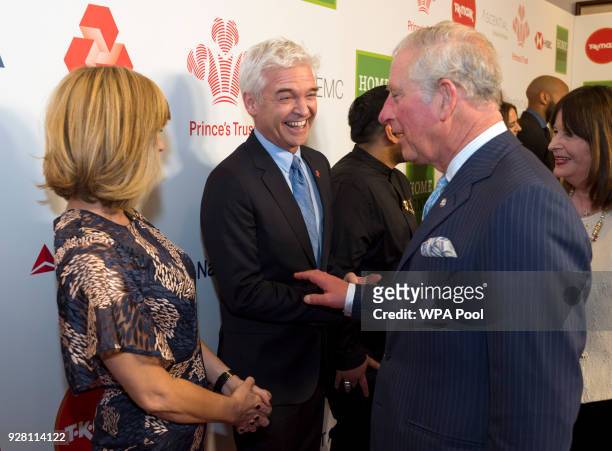 Prince Charles, Prince of Wales speaks to Celebrity Trust Ambassador Phillip Schofield as Kate Garraway looks on at The Prince's Trust Awards at The...