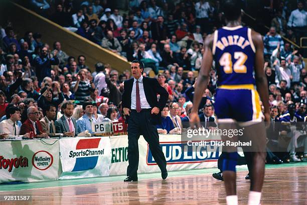 Head coach Pat Riley of the Los Angeles Lakers calls a play against the Boston Celtics during a game played in 1989 at the Boston Garden in Boston,...