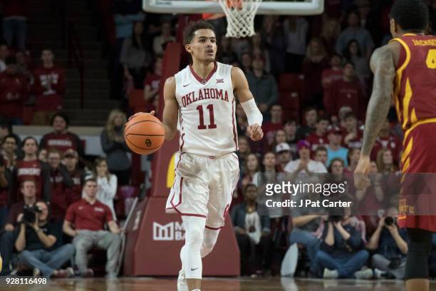 Oklahoma Sooners guard Trae Young brings the ball up court against Iowa State during the second half of a NCAA college basketball game at the Lloyd...
