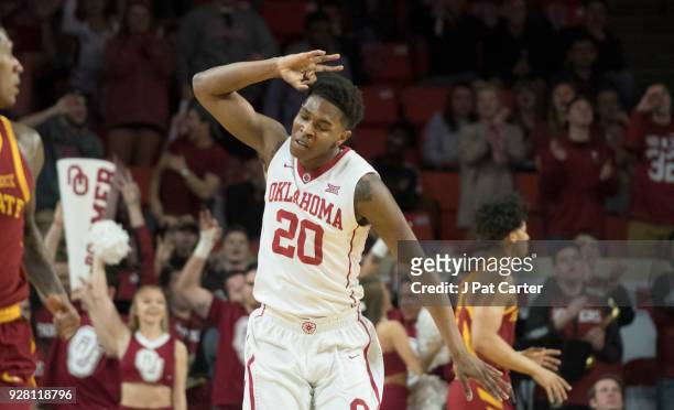 Oklahoma Sooners guard Kameron McGusty celebrates after scoring against Iowa State during the first half of a NCAA college basketball game at the...