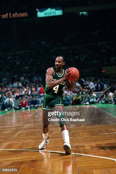 Sidney Moncrief of the Milwaukee Bucks looks to make a move against the Boston Celtics during a game played in 1989 at the Boston Garden in Boston,...