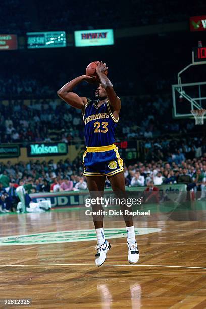 Mitch Richmond of the Golden State Warriors shoots a jump shot against the Boston Celtics during a game played in 1989 at the Boston Garden in...