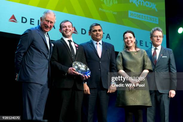 Prince Charles, Prince of Wales poses for a photograph with Delta Air Lines Rising Star Award winner Jack Hamblett at The Prince's Trust Awards at...