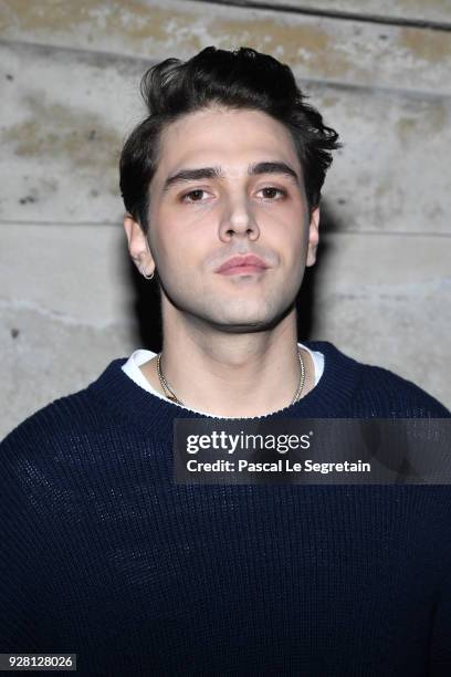 Xavier Dolan attends the Louis Vuitton show as part of the Paris Fashion Week Womenswear Fall/Winter 2018/2019 on March 6, 2018 in Paris, France.
