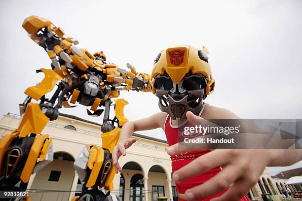Transformers robot Bumblebee, which stands at 5 metres tall and weighs 3 tonnes, is seen at Bondi Beach to launch the DVD of "Transformers: Revenge...