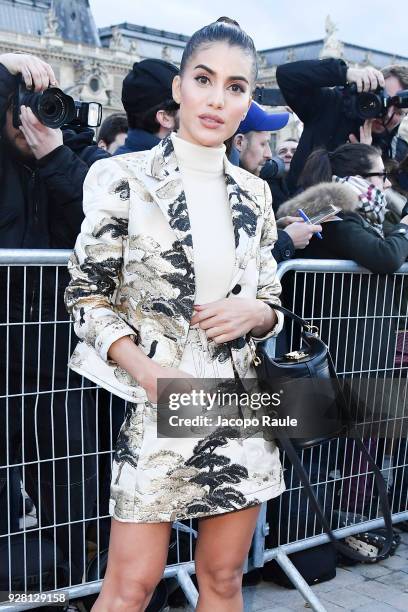 Camila Coelho attends the Louis Vuitton show as part of the Paris Fashion Week Womenswear Fall/Winter 2018/2019 on March 6, 2018 in Paris, France.