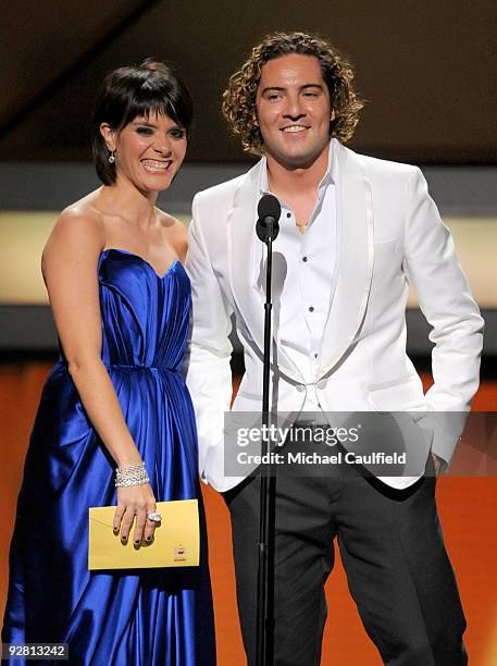 Singers David Bisbal and Kany Garcia speak onstage at the 10th Annual Latin GRAMMY Awards held at the Mandalay Bay Events Center on November 5, 2009...