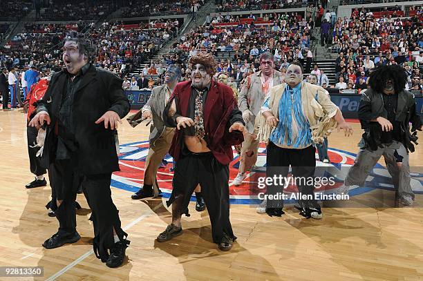 The Detroit Pistons dance team 'Spare Tires' perform during the game against the Oklahoma City Thunder at the Palace of Auburn Hills on October 30,...