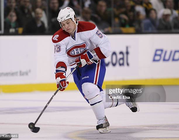 Ryan White of the Montreal Canadiens takes the puck against the Boston Bruins on November 5, 2009 at the TD Garden in Boston, Massachusetts. The...