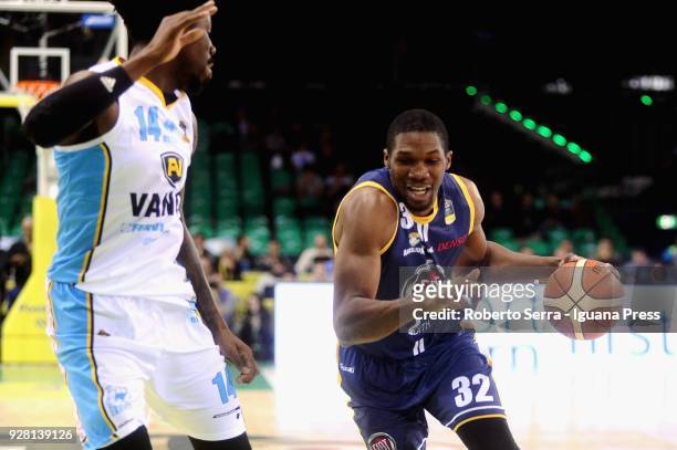 Trevor Mbakwe of Fiat competes with Henry Sims of Vanoli during the match semifinal of Coppa Italia between Vanoli Cremona and Auxilium Fiat Torino...