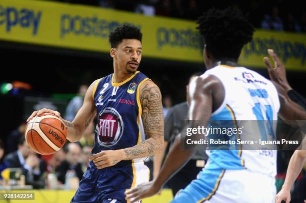 Diante Maurice Garrett of Fiat competes with Henry Sims of Vanoli during the match semifinal of Coppa Italia between Vanoli Cremona and Auxilium Fiat...