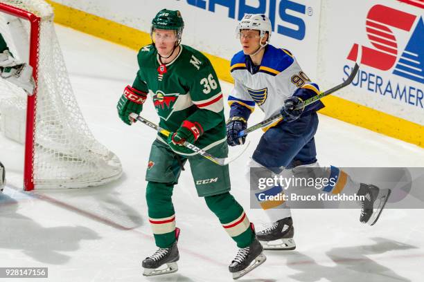 Nick Seeler of the Minnesota Wild defends Nikita Soshnikov of the St. Louis Blues during the game at the Xcel Energy Center on February 27, 2018 in...