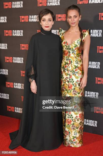 Dame Kristin Scott Thomas and Alicia Vikander attend the European Premiere of "Tomb Raider" at Vue West End on March 6, 2018 in London, England.