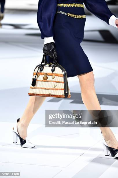 Model, fashion detail, walks the runway during the Louis Vuitton show as part of the Paris Fashion Week Womenswear Fall/Winter 2018/2019 on March 6,...